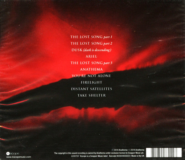 Back cover of the music album 'The Lost Song' by Anathema, featuring a dramatic red and black abstract design with white track listing text.