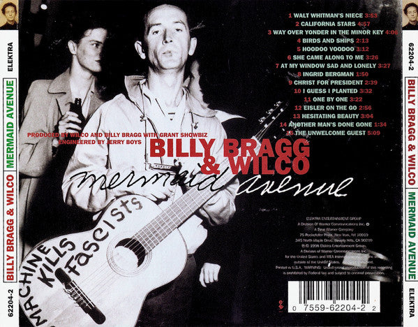 The back cover of the vinyl record 'Mermaid Avenue' by Billy Bragg & Wilco, featuring a black-and-white photo of the two men with a guitar, red and white text, and a tracklist on the right.