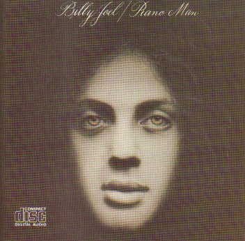Album cover for 'Billy Joel - Piano Man' featuring a close-up portrait of Billy Joel with a textured sepia-toned background and a 'Compact Disc' logo in the lower left corner.