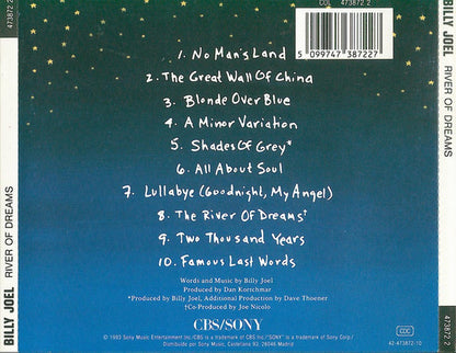 Back cover of the Billy Joel 'River of Dreams' CD, featuring a dark blue to green starry gradient background with white text listing the 10 tracks and a barcode at the top right.