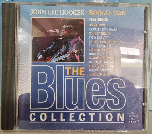 A CD jewel case for 'The Blues Collection' featuring John Lee Hooker, with a blue cover, tracklist on the right, and a photo of the musician performing.
