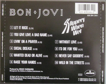 The back cover of a Bon Jovi 'Slippery When Wet' CD album, featuring the tracklist, barcode, and release details on a black background.
