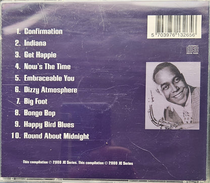 Back cover of a 2000 JG Series CD compilation featuring a tracklist on a purple background and a black-and-white portrait photo of Louis Armstrong.