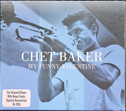 Chet Baker's 'My Funny Valentine' 2-CD box set cover, featuring a blue-toned photograph of the jazz musician playing a trumpet, with white text and a small pinkish label in the bottom-left corner.