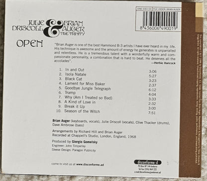 The back cover of a music CD for Julie Driscoll & Brian Auger's album 'Open', showing tracklist, credits, barcode, and website information on a brown background.