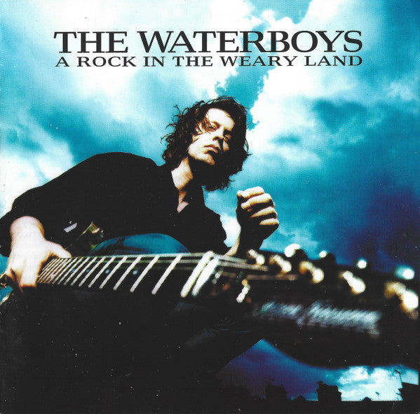 A Rock in the Weary Land — The Waterboys front cover