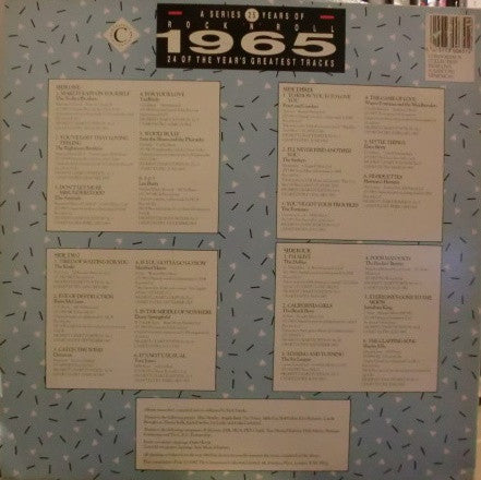 Back cover of a vinyl record with track listings on a patterned background