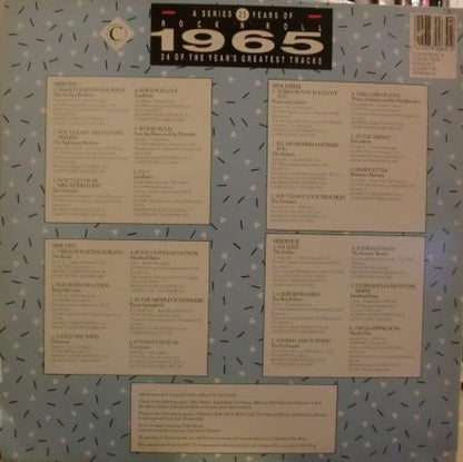 Back cover of a vinyl record with track listings on a patterned background