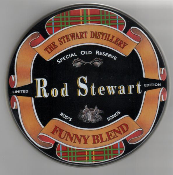 A round black metal tin label for Rod Stewart's 'Funny Blend' Special Old Reserve, featuring orange banners, red and green tartan patterns, and white text.