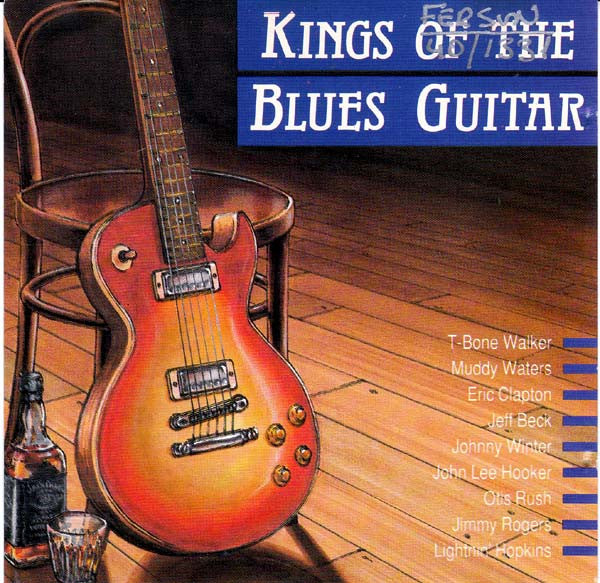 Guitar on a wooden floor with a chair and bottle, featuring 'Kings of the Blues Guitar' album cover.