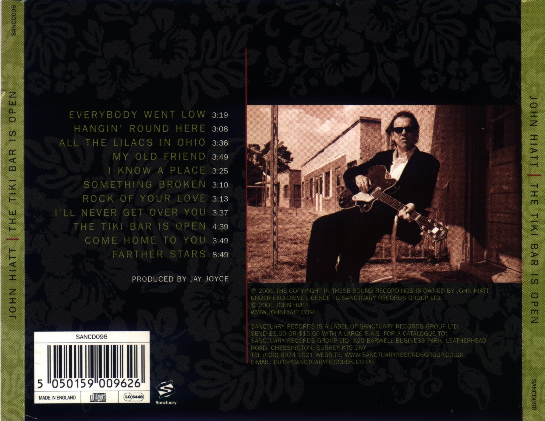 The Tiki Bar Is Open — John Hiatt back cover